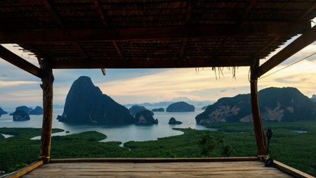 Wooden cabin on top of hill to see view of limestone karsts and adaman sea in Phang nga bay. Unseen...