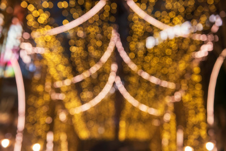 Abstract bokeh night in city. Blur yellow light decoration in town.