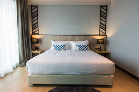 Interior of a luxury modern hotel bedroomの写真素材