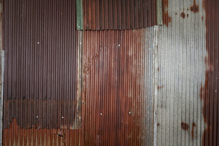 Old zinc wall textured background. Rusty iron fence.