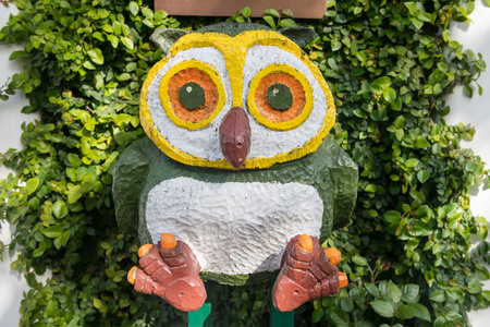 Cute big owl statue at Kamakura Komachi dori street, Kanagawa, Japan.の写真素材