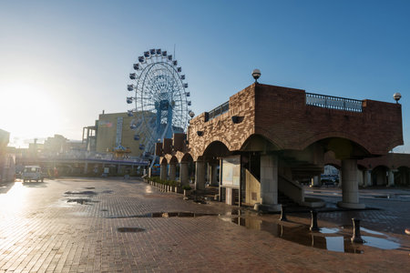 Shimizu, Japan - April 26, 2023: Brick bridge landmark with Ferris wheel at pulse dream plaza during sunset, Shizuoka. Famous shopping mall with amusement center based on the anime Chibi Maruko-chan.のeditorial素材