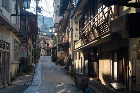 Nagano, Japan - April 13, 2019: Shibu Onsen is a small hot springs onsen town located in Nagano Prefecture. Various traditional ryokans along narrow alleyways.のeditorial素材