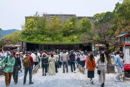 Fukuoka, Japan - Mar 30, 2024: Tourist people pray at floating forest temporary shrine at Dazaifu...