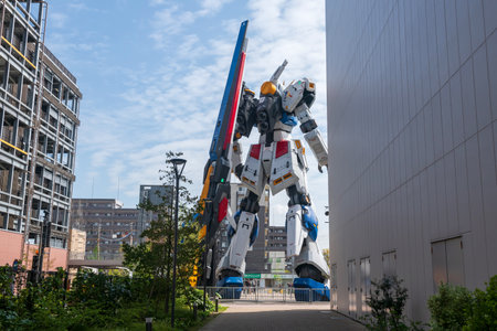 Fukuoka, Japan - April 7, 2024:Rear of life size RX 93ff Î½ Gundam robot statue against blue sky at Mitsui Shopping Park LaLaport.のeditorial素材