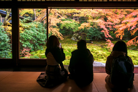 Tourist people in building view zen garden with autumn leaves at Rurikoin Temple, Kyoto, Japan. Famous travel destination for tourist sightseeing Kansai for fall season.の写真素材
