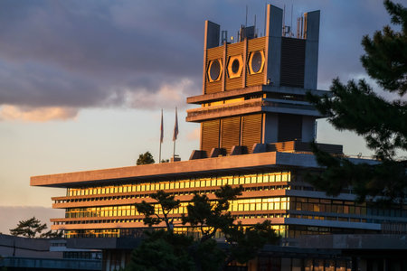 Nara city hall against sunset orange light at autumn, Kansai, Japan. Famous travel destination for tour in Kansai to see deer at peak fall in December.の写真素材