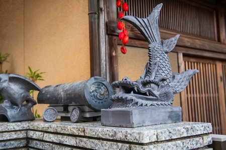 Shachihoko, imaginary fish with tiger head, on wall at Adashino Nenbutsuji temple, Arashiyama, Kyoto, Japan. Famous travel destination for tourist sightseeing of Kansai in fall.の写真素材