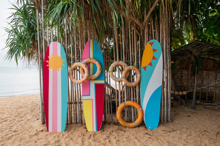Colorful surfboard of resort and hotel on Pattaya Jomtien beach, Chonburi, Thailand. Famous travel destination in tropical country, Siam at summer.の写真素材