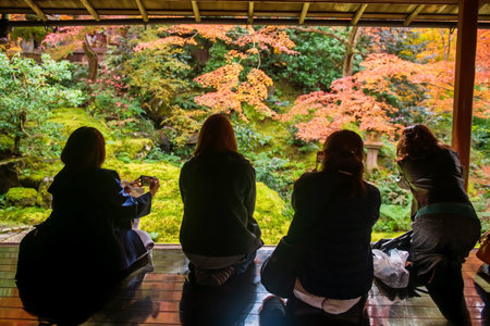 Tourist people in building view zen garden with autumn leaf and lantern at Rurikoin Temple, Kyoto,...