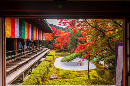Tourist people view sand garden of Eikando Zenrinji temple with autumn maple leaf colors, Kyoto, Japan. Famous travel destination for tourist sightseeing Kansai in fall season.の写真素材