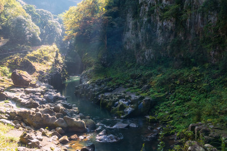 Beautiful scenic view of gorge Takachiho against sunlight, Nishiusuki, Miyazaki, Kyushu, Japan. Travel destination to sail rowboat to volcanic gorge to view Nature Scenery.の写真素材
