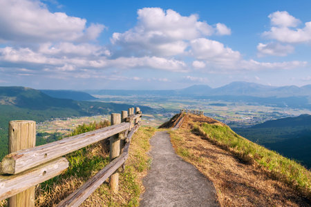 Scenic walking trail to view north rim of mount Aso volcanic caldera Kuju National Park at Nishiyunouraenchi Observatory, Kumamoto, Japan. Famous travel destination to sightseeing Kyushu.の写真素材