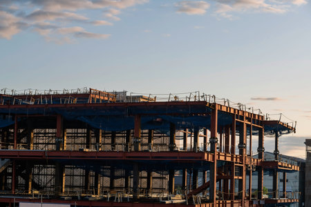 Under construction site at sunset in Shizuoka, Japan. High rise building real estate construction in...