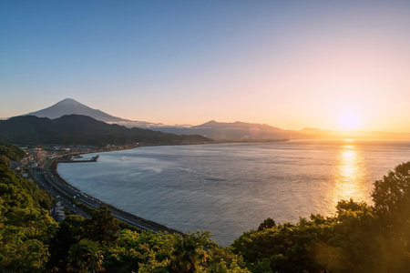 Mt.Fuji, Suruga gulf, Tomei highway seen from Satta Toge pass at sunrise with reflection on sea, Shimizu, Shizuoka, Japan.の写真素材