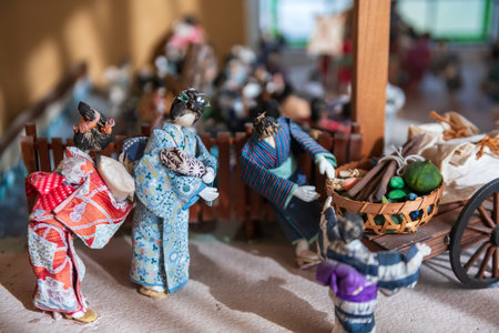 Traditional Japanese dolls demonstrate ancient Japanese community in Tenryo Hina Goten museum, Mamedamachi street, Hita town, Oita, Japan.  Edo-period folk culture for hina matsuri doll festivalの写真素材