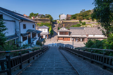 Kitsuki, Japan - Oct 12, 2025: Iconic Suya no Saka slope with preserved Kitsuki castle town, Oita...