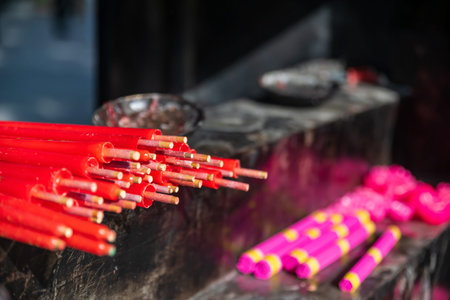 Red incense or joss stick in Longhua temple, Shanghai, China. Famous Buddhist temple of Maitreya Buddha, architectural design of Song dynasty