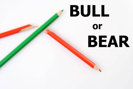 Stock market concept with chart made from red and green crayonsの写真素材