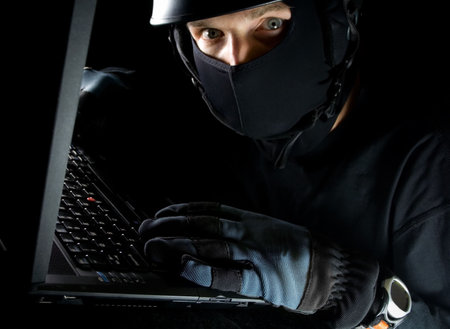 Computer theft on laptop at night