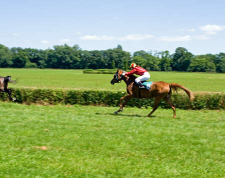 Horse racing, motion blurredの写真素材