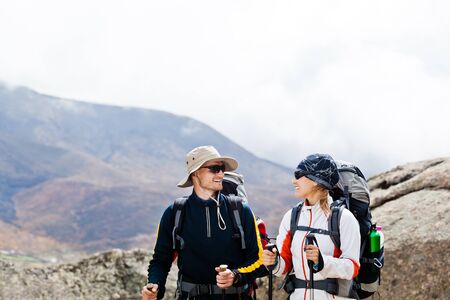 Couple hiking in Himalaya mountains in Nepalの写真素材