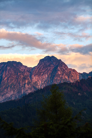 Giewont Mountain, Inspiring Mountains Landscape, beautiful day in summer Tatras, mountain ridge over blue sky in Zakopane, Polandの写真素材