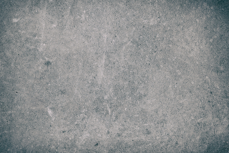 Concrete gray and white background of natural cement or stone texture on a wall or floor.の写真素材
