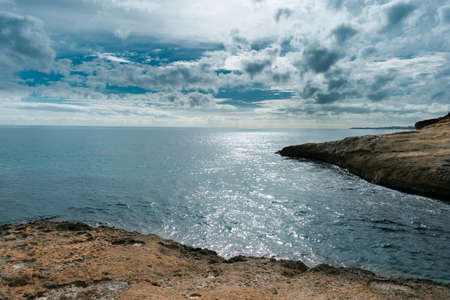 fantastic beach in Spain with a sky with clouds.の写真素材