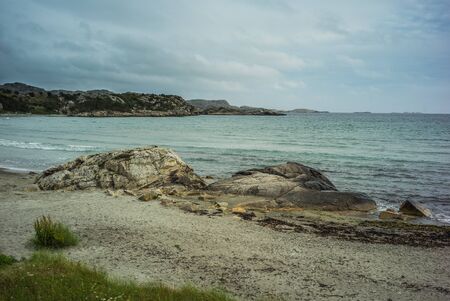 huge rocks on Norwegian beachの写真素材
