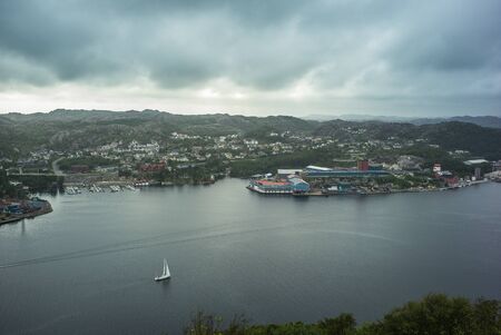 Fjord in Norway port with white boat.の写真素材