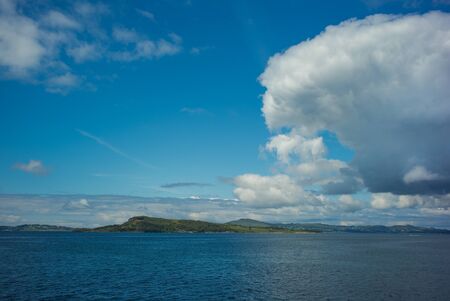 Norwegian  island and sky full of  clounds, Norwayの写真素材