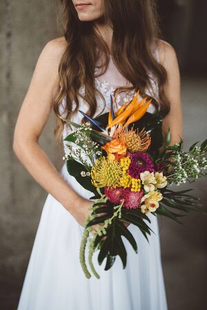 Wedding bouquet of the bride, the wedding bouquet from orange flowers, wedding floristryの写真素材