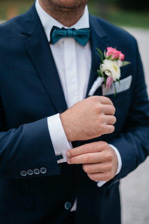 Wedding bouquet of the groom, the wedding bouquet, wedding floristry, grooms suit