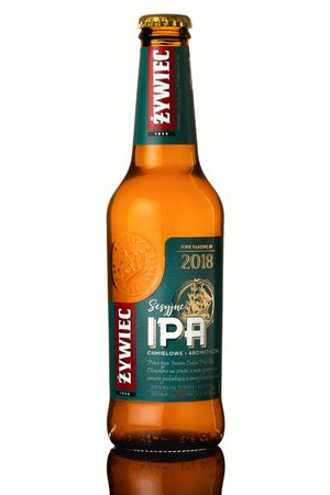 product photo of polish beer bottle on white backgroundのeditorial素材