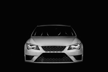 Car Isolated against black backdropの写真素材