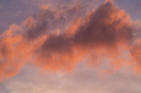 Pink sky at dusk, isolated against blue, detailの写真素材