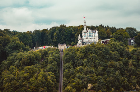 View of Gutsch Castle hotel in Lucerne Switzerland cloudy dayのeditorial素材