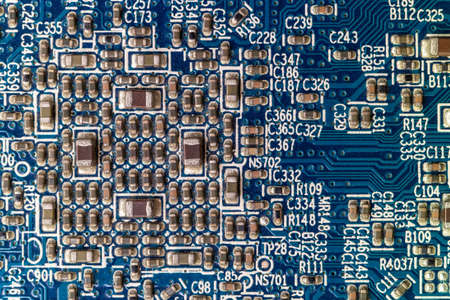 Macro close up view of a blue circuit board full of transistors 2019の写真素材