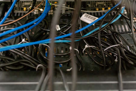 Convoluted electrical cables held together with zip ties in a science lab 2020の写真素材
