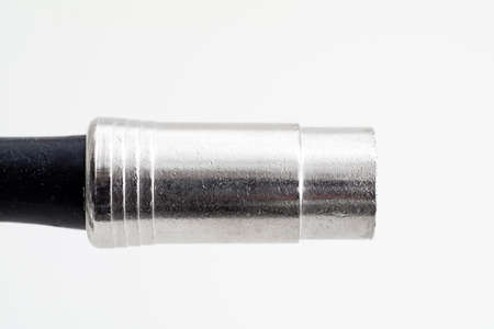 XLR din metal plug connector horizontal side close up shot isolated on whiteの写真素材