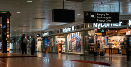 International airport duty-free shop during peak travel season unrecognizable people.