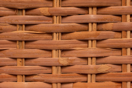 Worn out wooden woven grid texture macro close up shot front view.