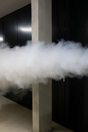 Nitrogen white cloud stream inside building room.の写真素材