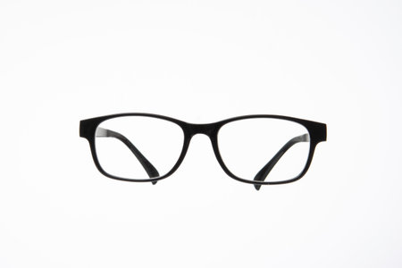 Black plastic frame eyeglasses. Close up studio shot, isolated on white background, no people.