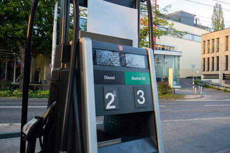 Self service gas station with gas and diesel nozzles in Switzerland. Close up shot, no people.