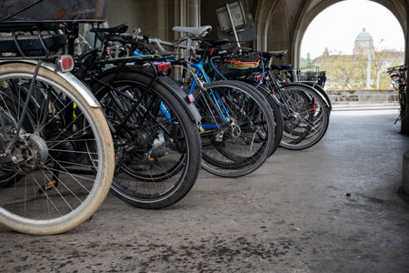 City bike racks or public bicycle parking in Zurich city Switzerland. Many bikes, wide angle, no people.の写真素材
