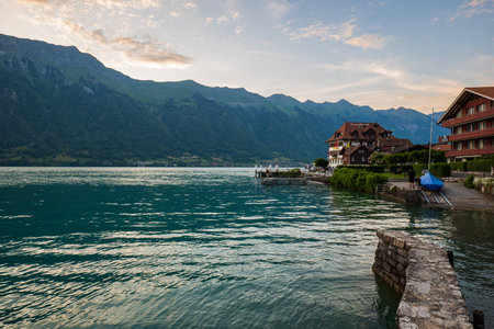 Beautiful sunset in famous small tourist village Iseltwald, Switzerland. No peopleの写真素材