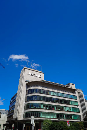 03-08-2023 Jelmoli department store in Zurich city Switzerland. Exterior view, logo, sunny summer day. Blue sky, street-angle view, no people.のeditorial素材