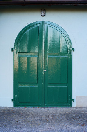 Beautiful old wood entrance door.  Large door, exterior shot, no people, Europe..の写真素材